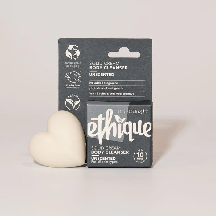 Ethique solid cream body cleanser with packaging on a light gray background