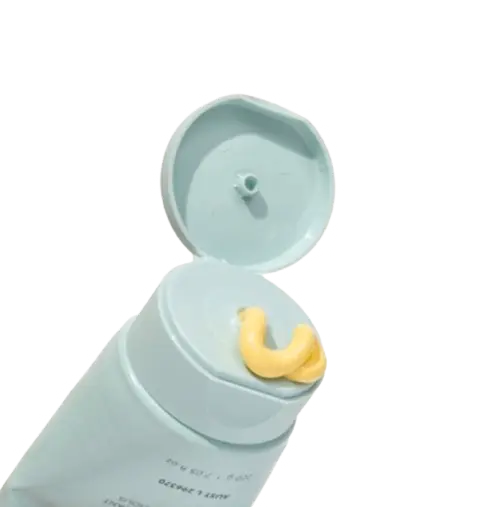 people4ocean p4o mineral sunscreen tube with sunscrren coming out of lid and no background