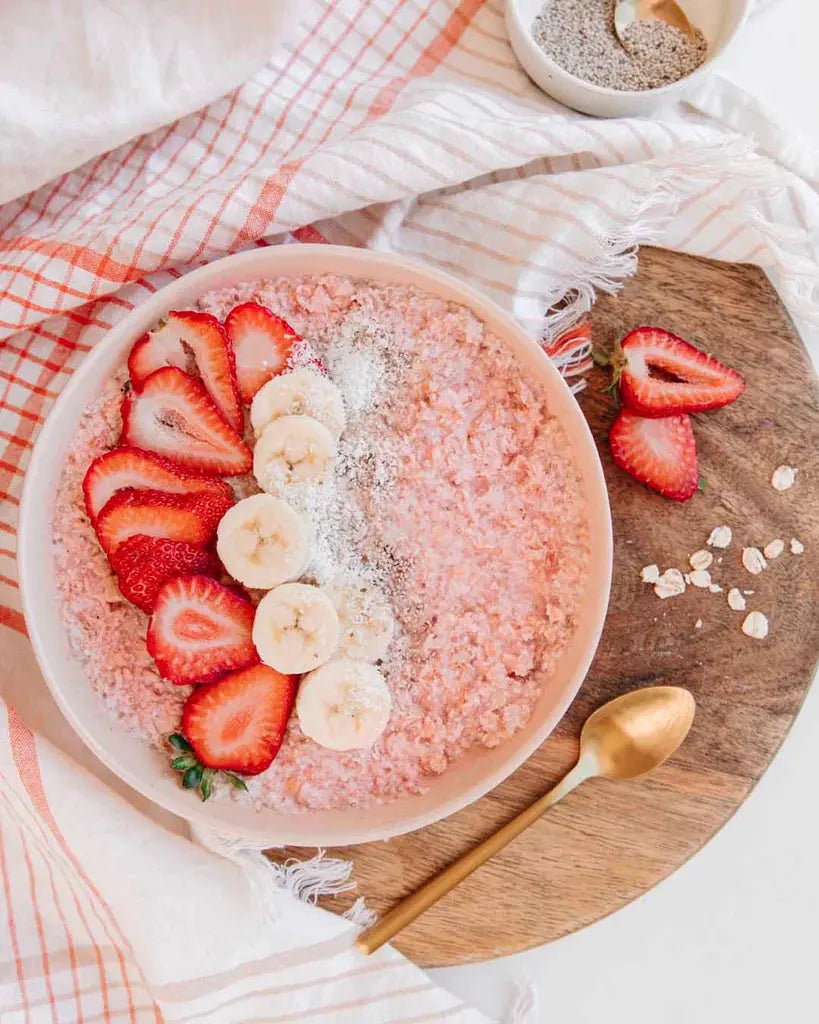bowl of porridge with nutra organics brekkie hero added to it