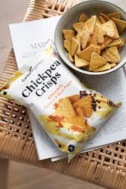 Organic Chickpea Crisps - Turmeric & Black Pepper with a b Bowl of Crunchy Chips