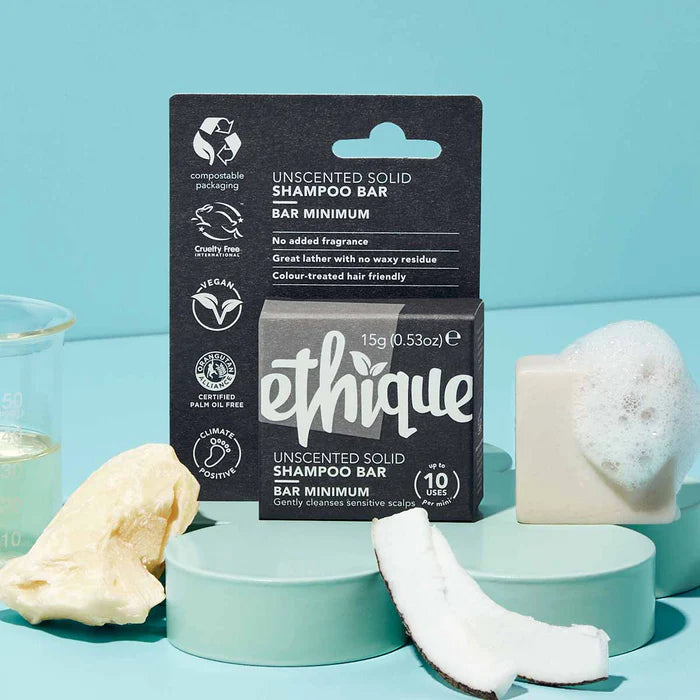 Ethique unscented solid shampoo bar packaging on a blue background