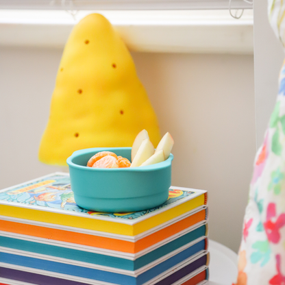 bobo and boo green snack bowl styled with fruit
