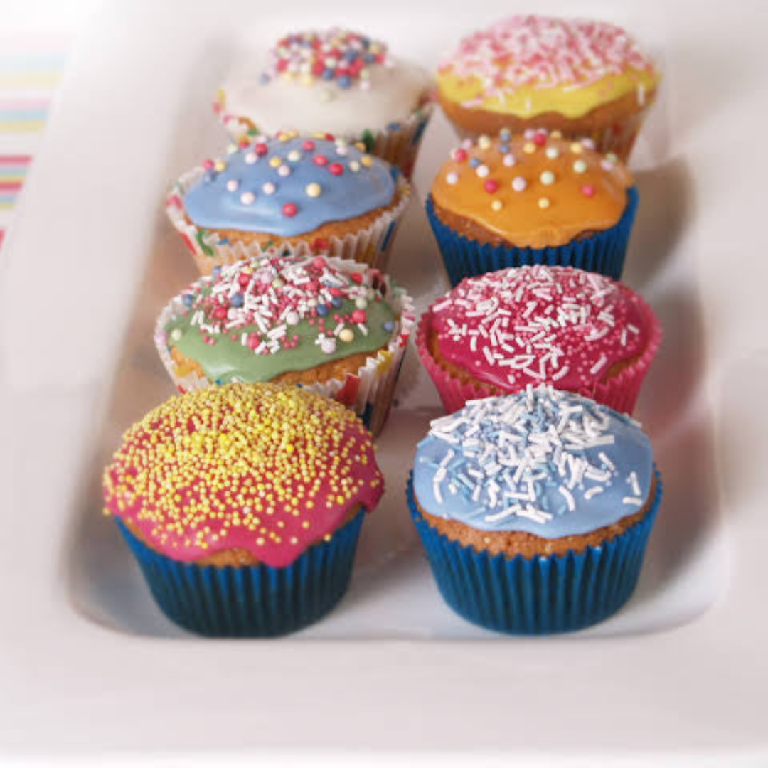cupcakes made with hopper food colours and decorations