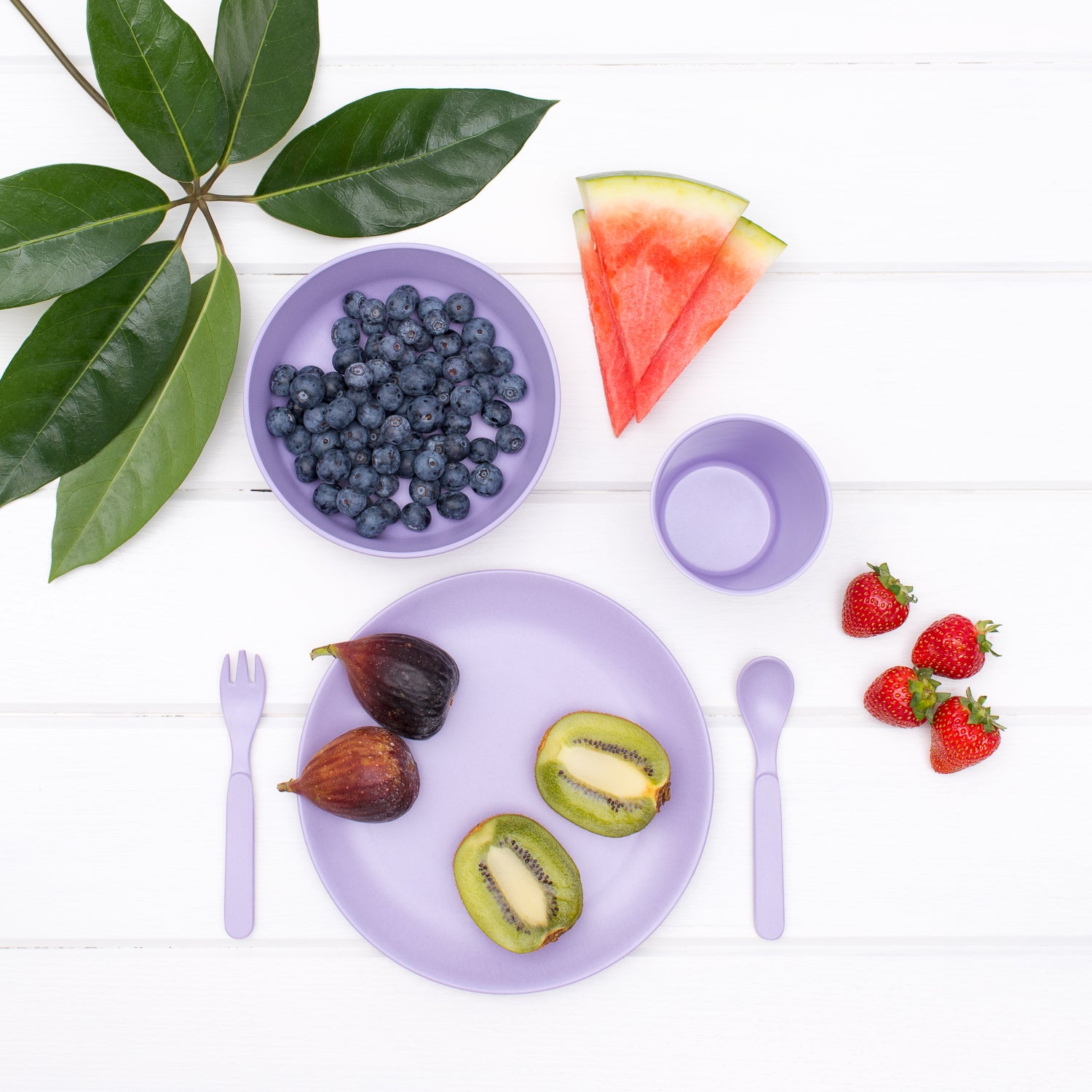 bobo & boo lilac bamboo dinnerwear giftset styled with a range of fruits