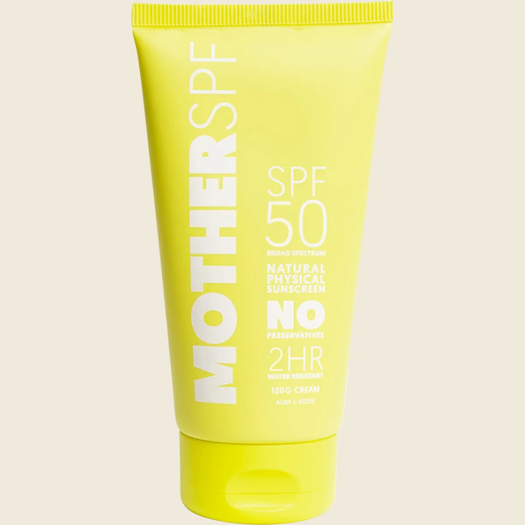 A bright yellow squeeze tube of MOTHERSPF 50 broad spectrum sunscreen, featuring white text and a matching yellow cap, set against a solid light beige background.