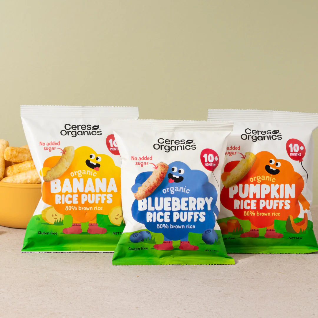 Three packages of Ceres Organics organic rice puffs, banana, blueberry and pumpkin