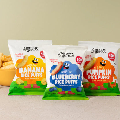 Three packages of Ceres Organics organic rice puffs, banana, blueberry and pumpkin